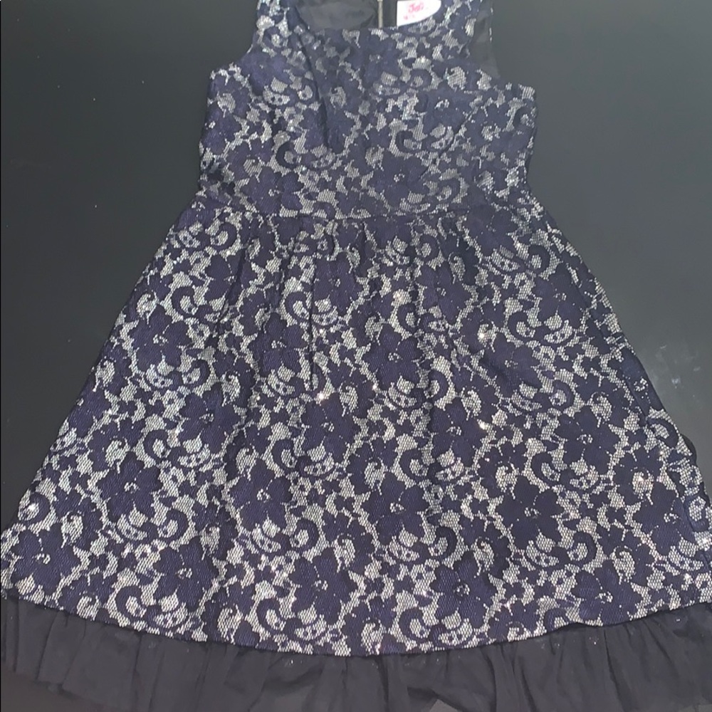 A navy blue dress with silver and blue detailing